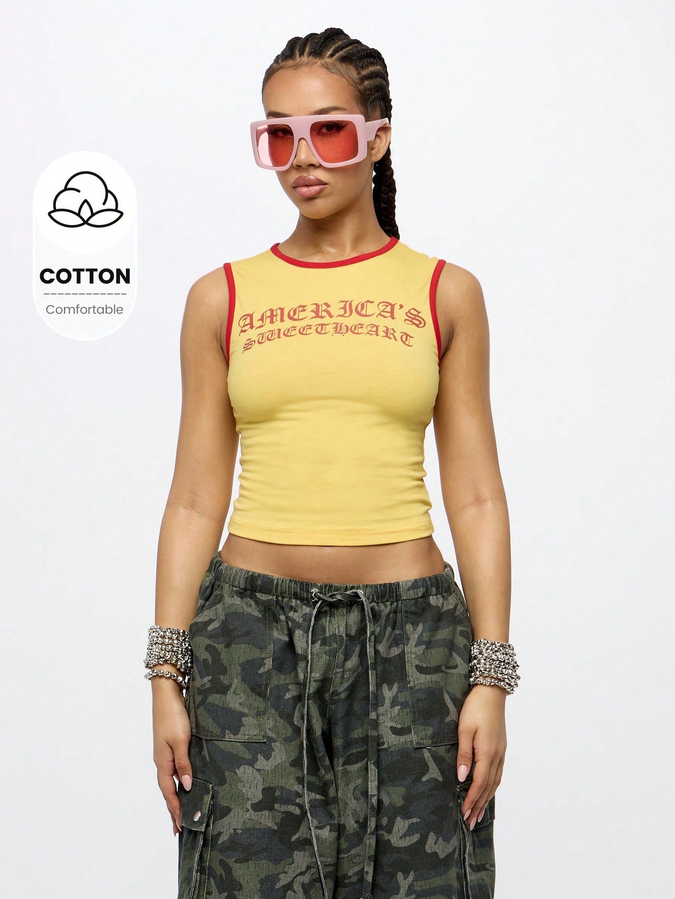 Orangina SumWon yellow crop tank front view with red contrast trim