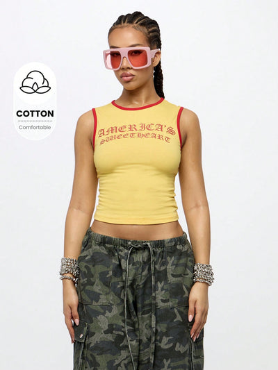 Orangina SumWon yellow crop tank front view with red contrast trim
