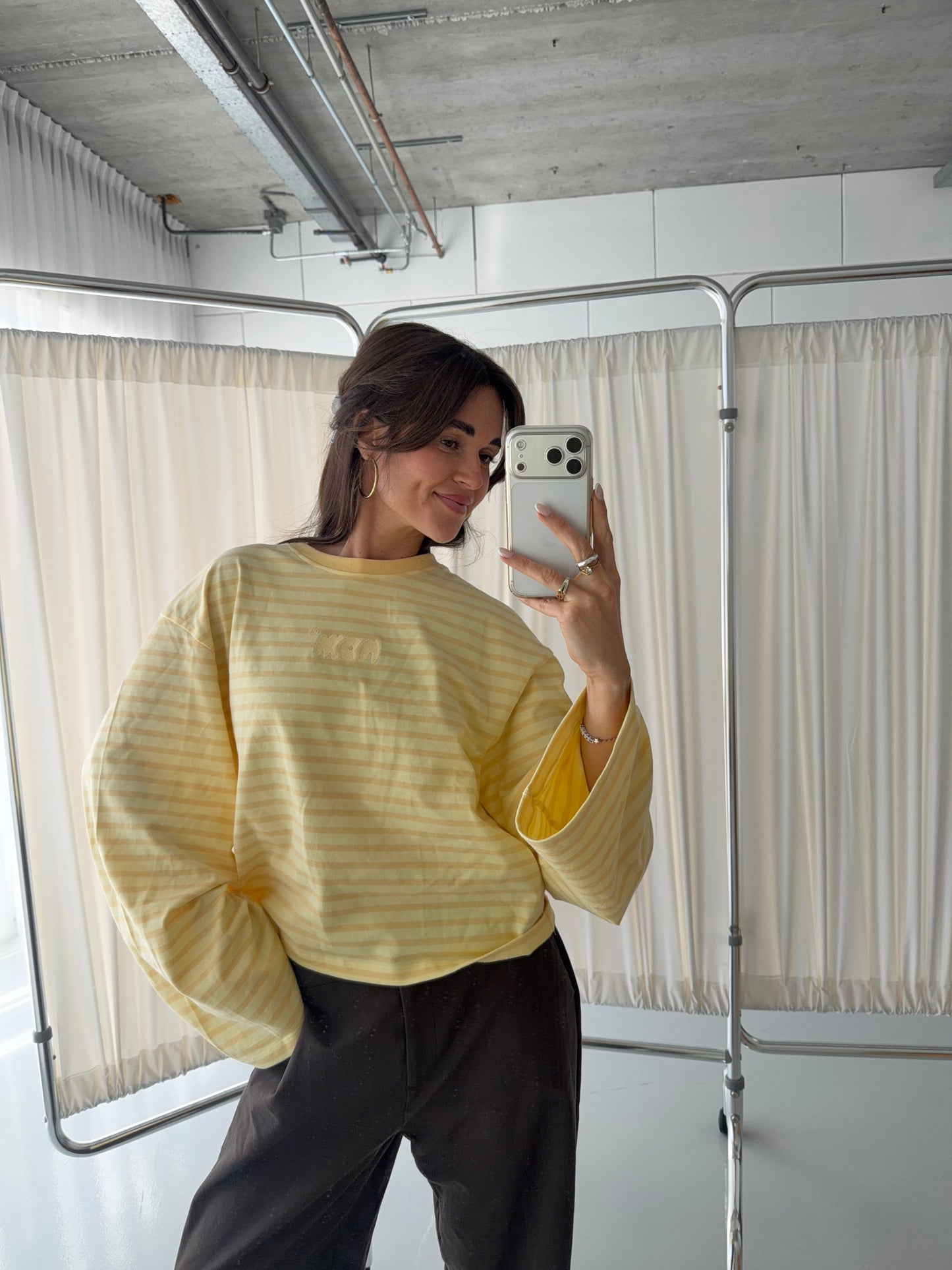Model wearing size L butter yellow striped long sleeve